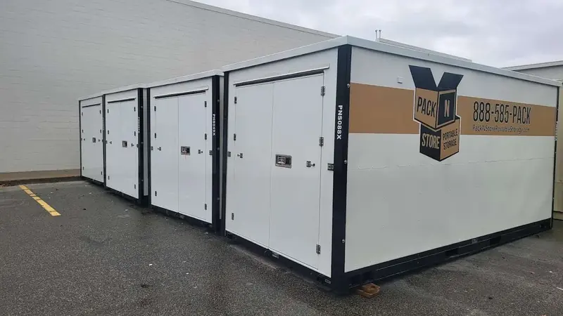A row of Pack N Store containers ready for delivery